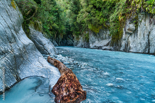 The crystal clear turquoise water in the Callery Gorge at NZ  West Coast near franz Josef