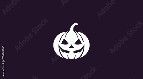 White pumpkin carving with a spooky face against a dark purple background.