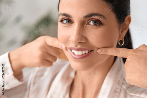 Young woman doing face buil...