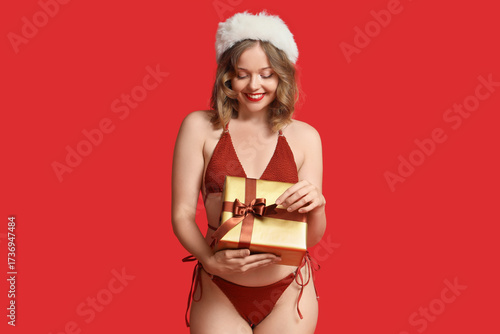Attractive young woman in s...
