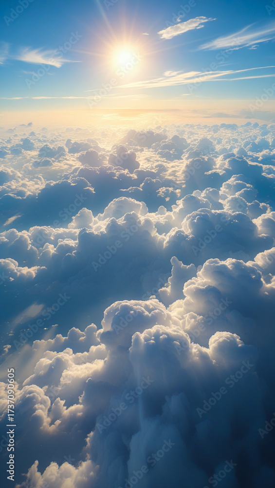 Obraz premium Bright sun shining above a sea of fluffy clouds