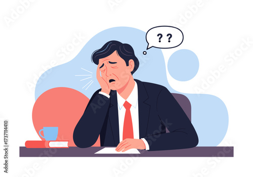 Confused businessman sitting at desk with question marks.