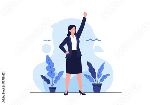 Successful businesswoman celebrating victory with raised fist.