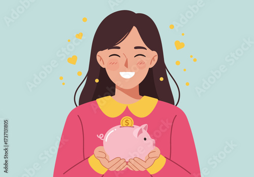 Happy woman holding a piggy bank saving money for the future.