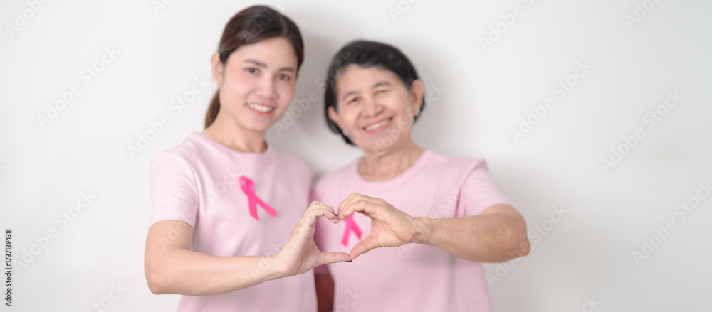 Obraz premium Couple woman with pink Ribbon for Pink October Breast Cancer Awareness month, May Women Health, November Birth Parents Adoption, women rights, Empowerment, March International Women day and Cancer day