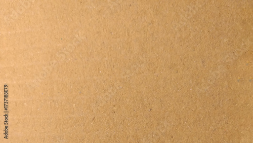 Paper texture - brown kraft sheet background. Recycle paper background. Wrapping paper beige color material.