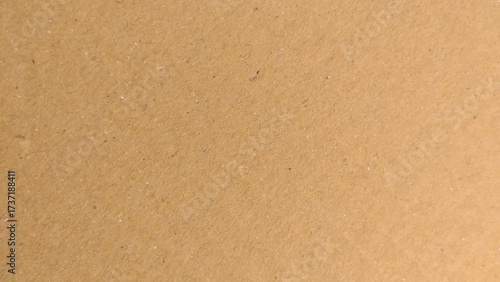 Paper texture - brown kraft sheet background. Recycle paper background. Wrapping paper beige color material.