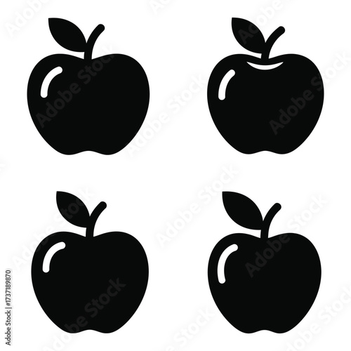 Four simple silhouette apples with stems and leaves graphics represents fresh fruit for healthy eating and nutrition concepts silhouette