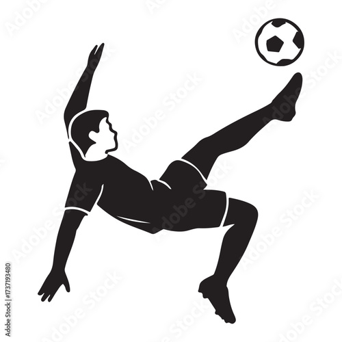 Silhouette of a Soccer Player Performing a Bicycle Kick.