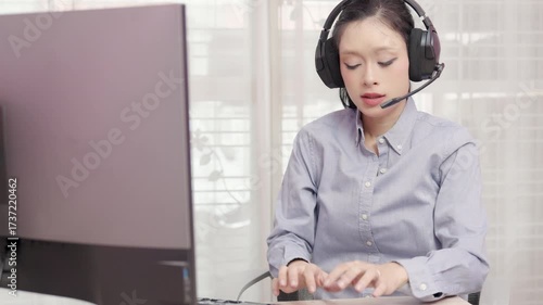 Asian Woman Work At Home or Call Center Person.