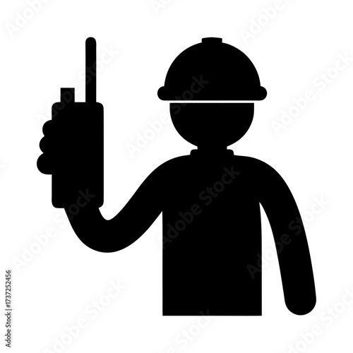 Construction worker in hard hat holding walkie talkie silhouette