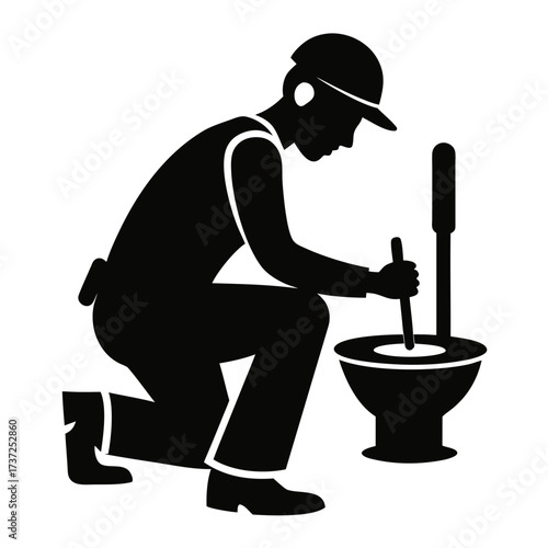 Plumber kneeling working on toilet silhouette