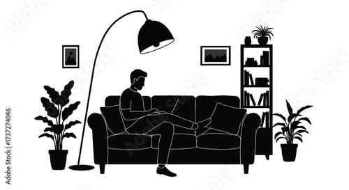 A person working on a laptop while relaxing on a couch indoors