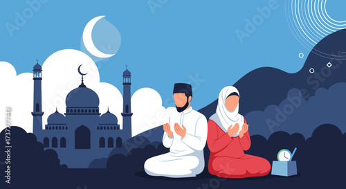Muslim couple praying during the holy month of Ramadan with a mosque in the background.