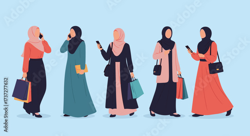 Diverse group of women dressed in stylish hijabs walking and holding shopping bags.