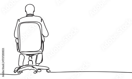 Man seated in chair, rear view