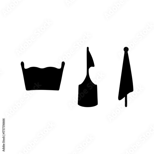 Black silhouettes of basin, garment, and beach towel on a white background