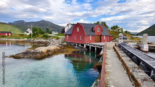 Red fisherman's house and pier in Norway, beautiful architecture