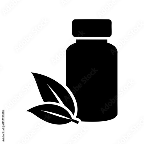 Black and white bottle of medicine with organic leaves for health