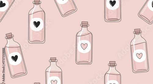 A collection of delicate glass bottles filled with a light pink liquid each adorned with a heart shaped label.
