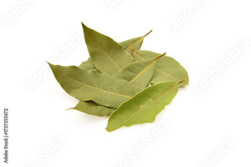 Dried natural bay leaves closed up isolated on white