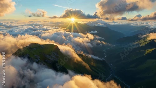 Scenic Aerial View Flying Over Mountain Peaks Through Morning Clouds