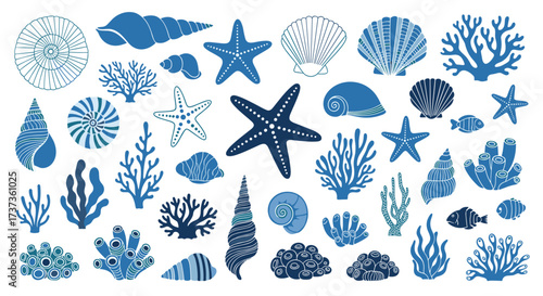 A collection of blue marine life and seashells found on a sandy beach.