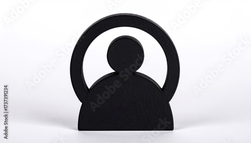 Black silhouette of a person inside an arched frame against a white backdrop