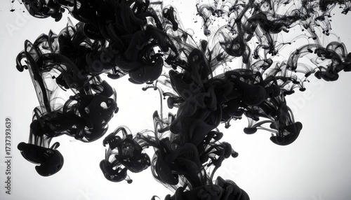 Black Ink Diffusing in Liquid Abstract Background