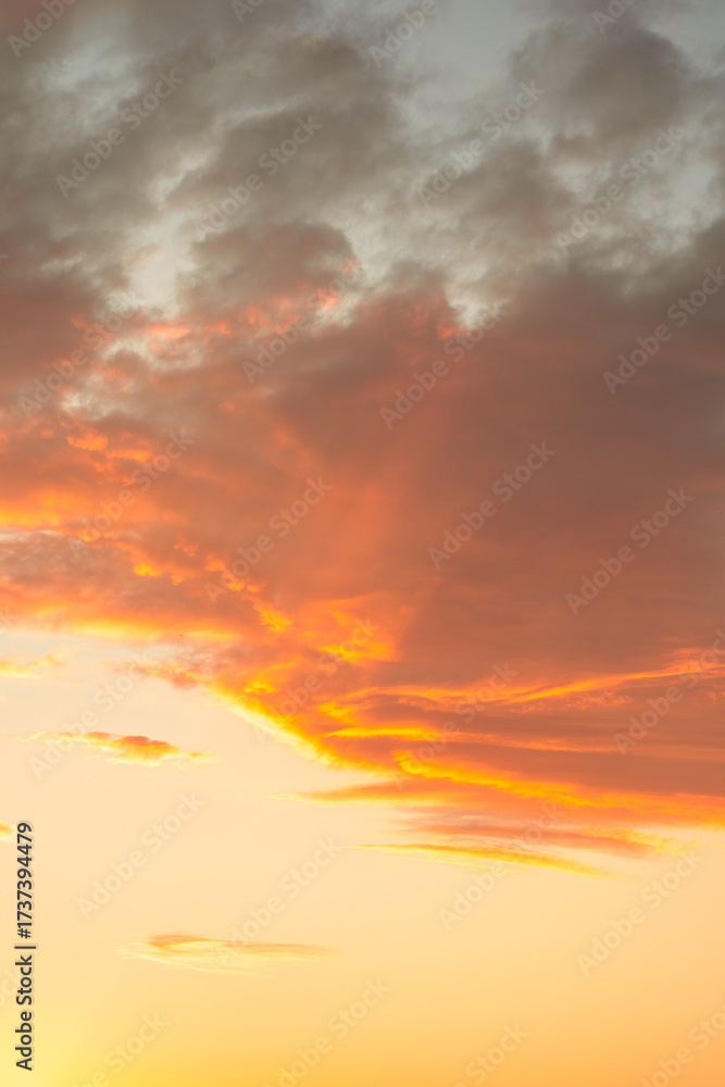 Obraz premium Dramatic Sunset Sky with Orange Clouds