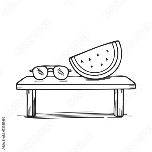 A watermelon placed near a pair of sunglasses on a bench