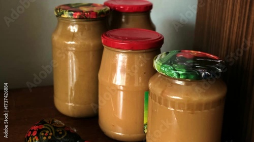 Close-up of grandma's homemade preparations in jars for the winter.