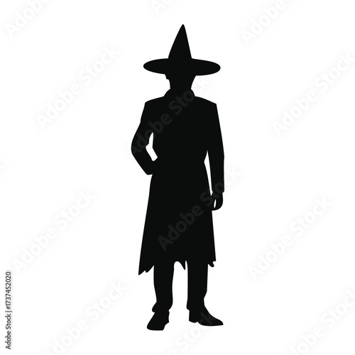 Silhouette of a person in a witch costume with a pointed hat