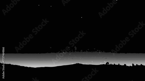 Serene monochrome night sky with visible stars over a dark tranquil landscape and distant horizon, atmospheric and peaceful.