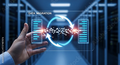 Data migration concept a hand holding a transparent screen displaying the process of transferring data between two servers in a modern data center environment