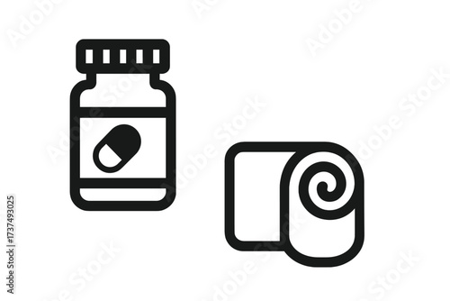 Pill bottle and rolled towel symbolize health and wellness routine during morning time