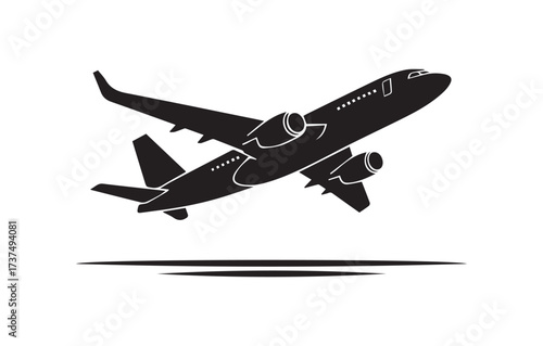 Black silhouette of a commercial airplane ascending from a runway