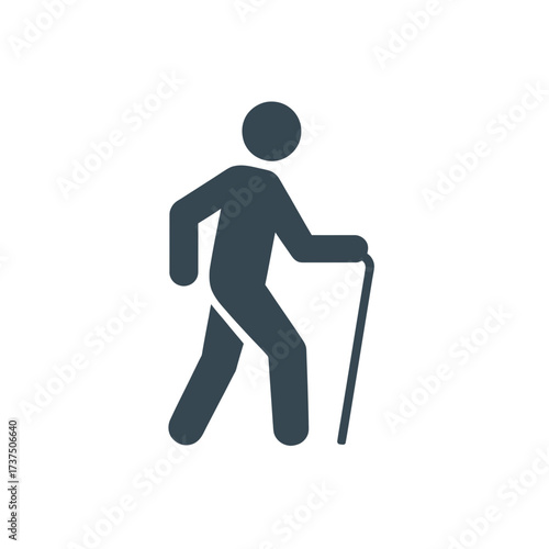 Person walking with cane concept of walking, hiking, trekking, and outdoor activity for senior people