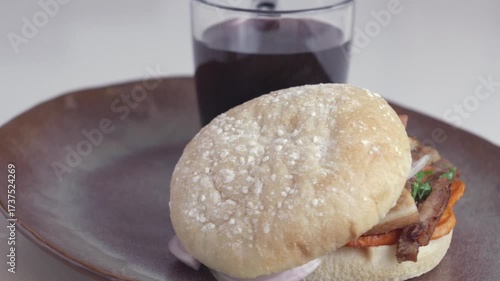 Traditional Peruvian breakfast: Bread with pork rinds and a cup of coffee.