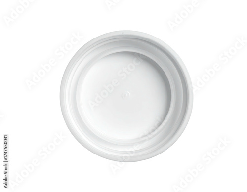 Overhead shot of a clean, white plastic cap against a black background