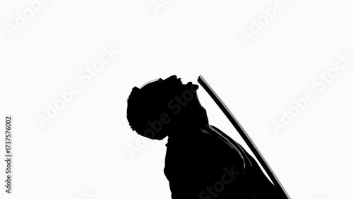 Powerful silhouette of a man singing with passion, emotional performance expressing freedom and soul