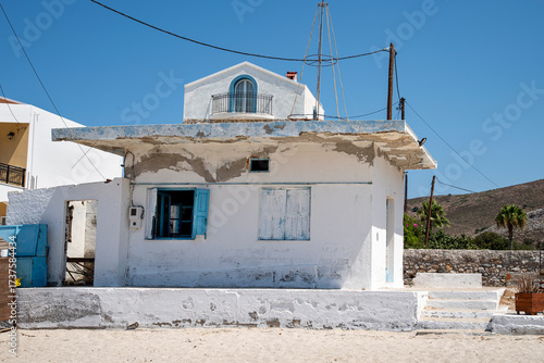 Old white house located on a Greek island.