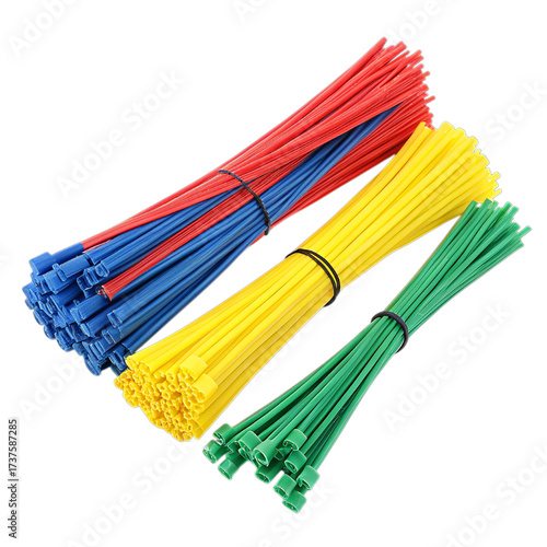 A vibrant assortment of multicolored plastic cable ties, featuring bundles of red, blue, yellow, and green fasteners, isolated on a clean white background