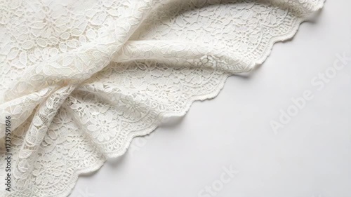 Delicate White Lace Fabric on a Plain White Background.