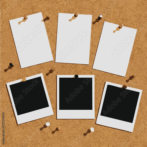 Corkboard with Blank Cards and Instant Photos Pinned Up.