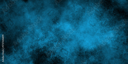 Abstract teal blue watercolor background with dark edges perfect for textures wallpapers and artistic design projects and presentations