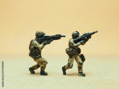 Canvastavla Mini toy of action figure at table with blurred background