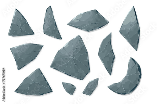 Collection of sharp shattered glass fragments with cracks and reflections
