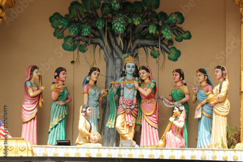 Photography Statues of Lord Krishna with Gopis on the rooftop of a Hindu temple in Kuala Lumpur, Malaysia