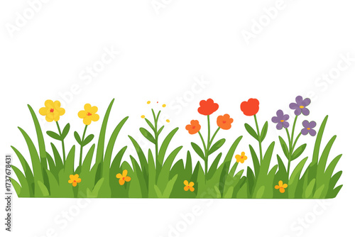 Vibrant spring flowers and fresh green grass growing in a natural garden setting